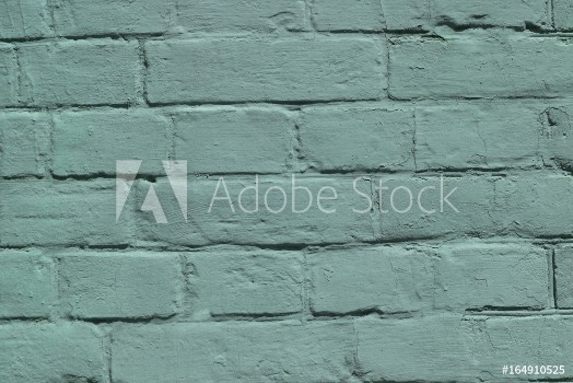 Picture of Brick wall covered with green lime